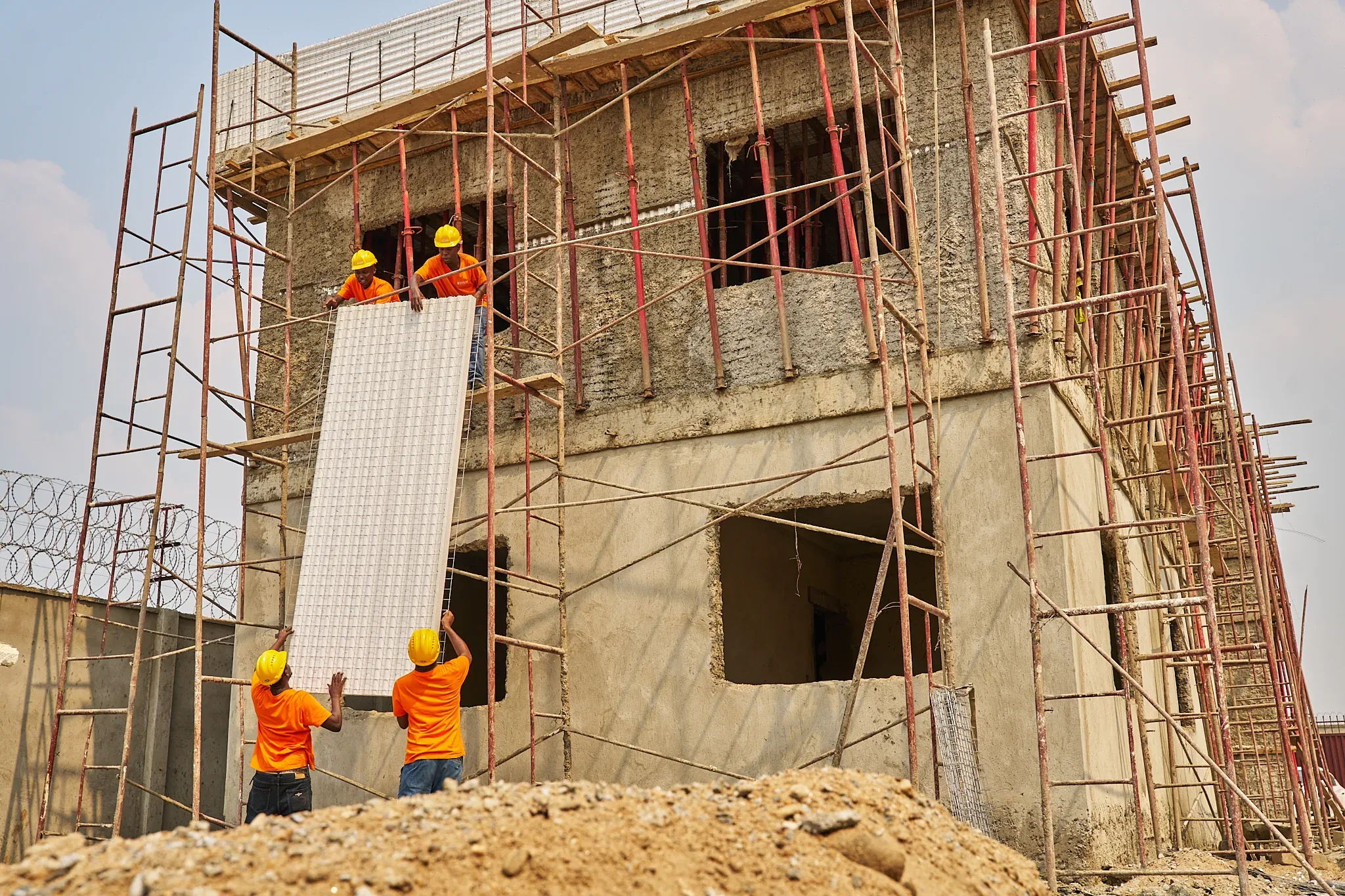 SPECO EPS panel installation underway on a construction site in Juba