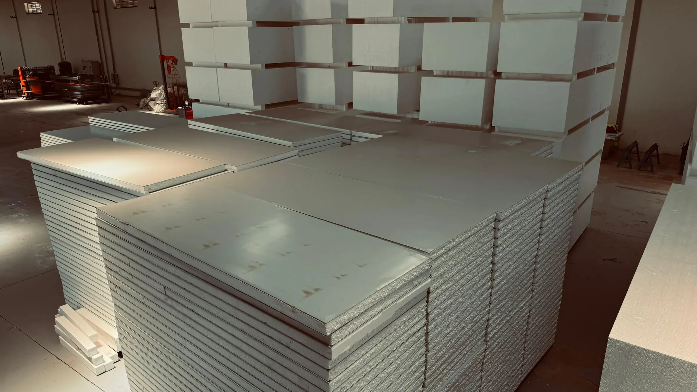 Stacked prefab sandwich panels in the SPECO warehouse, Juba
