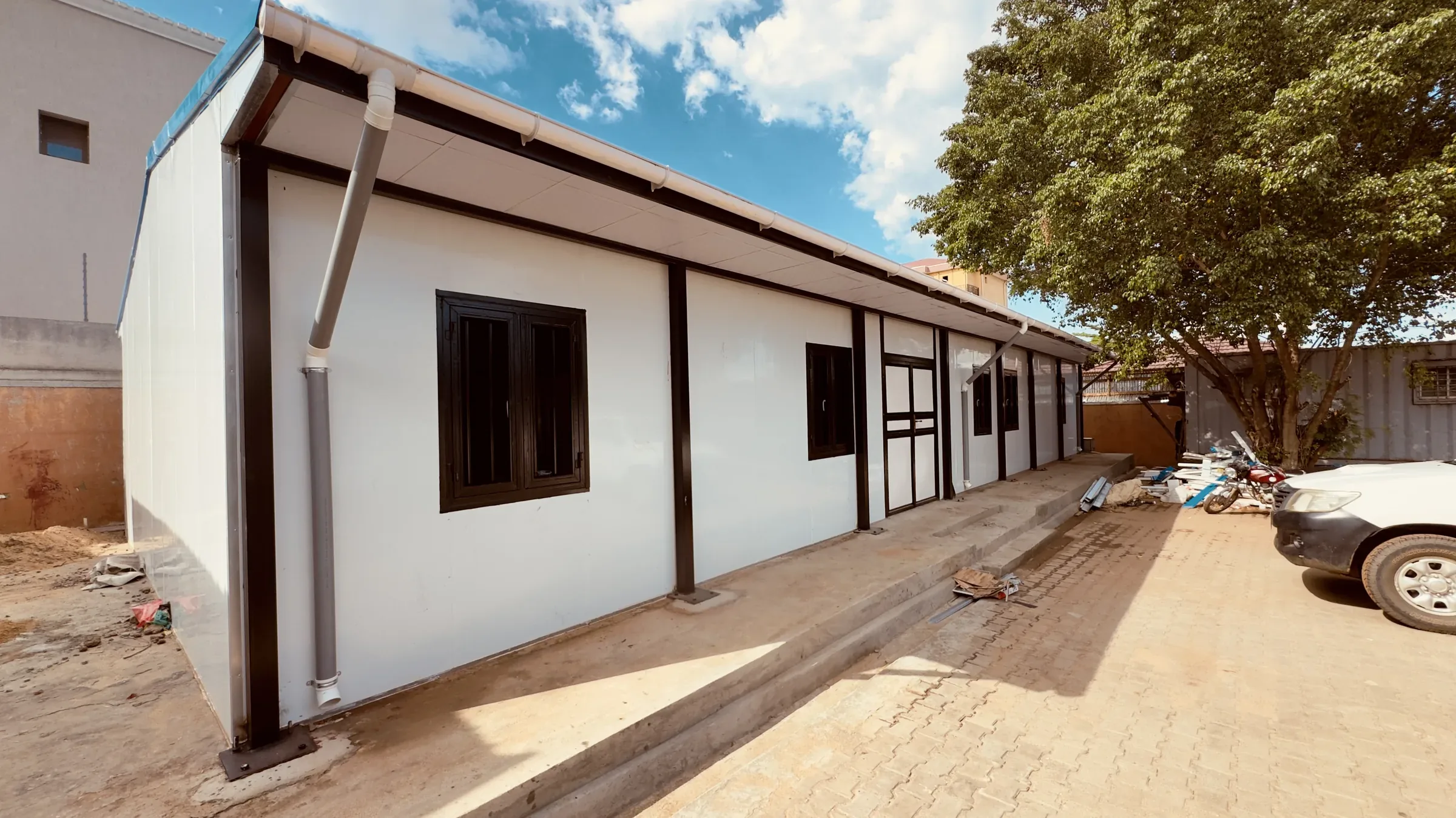 SPECO prefab office block in Juba with gutters and downpipes installed